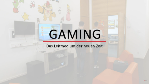 Schriftzug "Gaming - Das Leitmedium der neuen Zeit" vor ausgegrautem Hintergrund